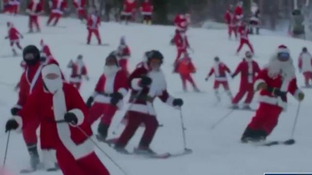 Santas in action: Watch Santa ski and scuba dive leading up to Christmas