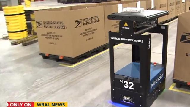 Postal Service promises that robots, thousands of hires will deliver Christmas on time