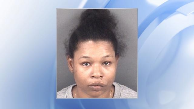 Deputies: Hope Mills woman tried to burn down house with man, baby inside