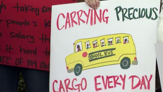 Johnston teachers, school staff rally for raises