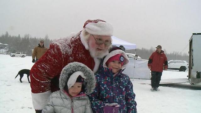 Santa brings holiday cheer (and ice fishing!) in Alaska 