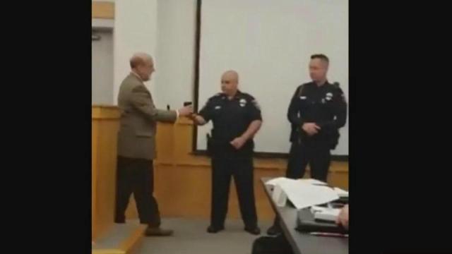 Facebook shows Smithfield officer accused of threat had won award for saving a life