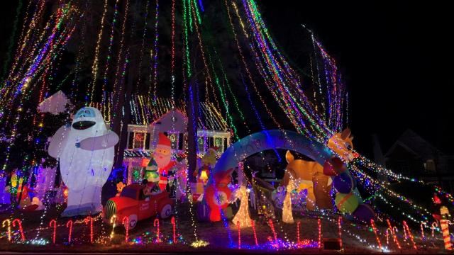 Waterfall of Christmas lights: Cary home flips switch on 200,000 lights Thanksgiving eve
