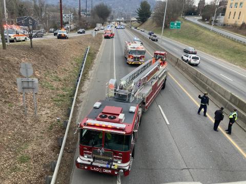 A truck crashed into an overpass bridge in Asheville shutting down Interstate 240. 