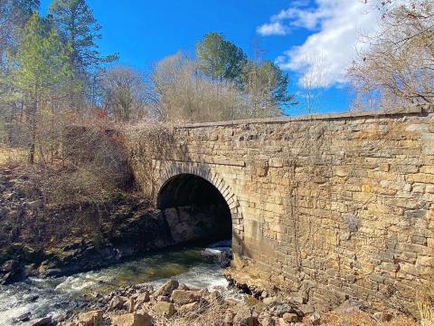 A 200-year-old aqueduct on the Roanoke Canal Trail was built by enslaved labor in the early 1800s. Later, it would play a large role in helping Freedom Seekers escape as part of the Underground Railroad.