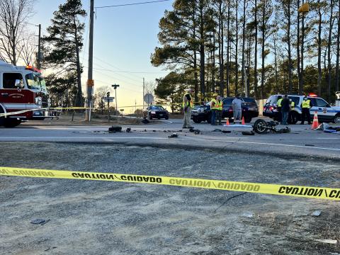 Fatal crash between moped and dump truck leaves 1 dead, highway shut down
