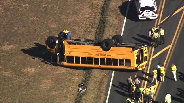 'Sounded like crashing:' 11 students, bus driver taken to hospital after Cleveland High school bus overturns