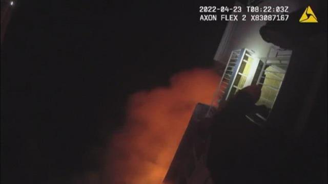 Police rescue a baby girl from an apartment fire