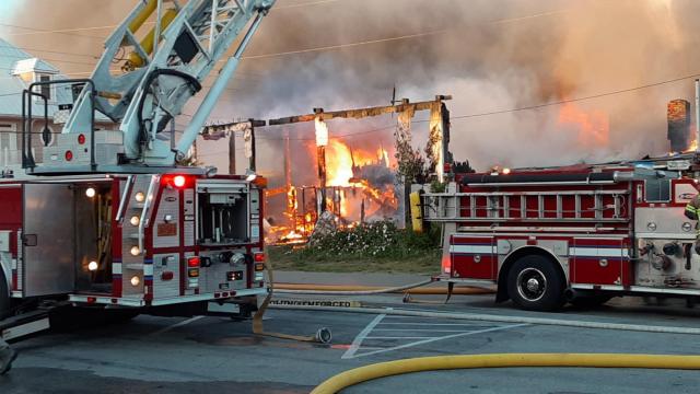 Trespasser arrested as closed Surf City motel burns in large fire