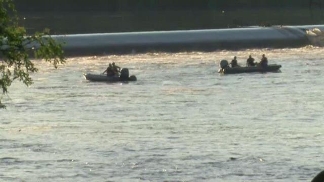 At least 2 missing after kayakers go over dam in Virginia