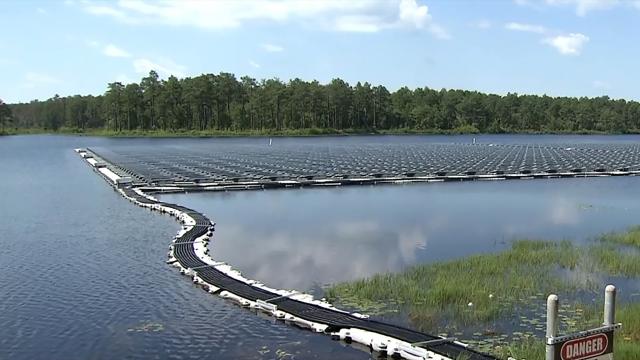 Solar panels float on lake to power Fort Bragg's Camp Mackall