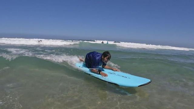 Camp teaches people with disabilities how to surf
