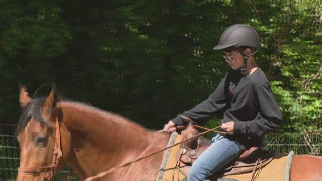 Young entrepreneur buys horse with proceeds from starting own business