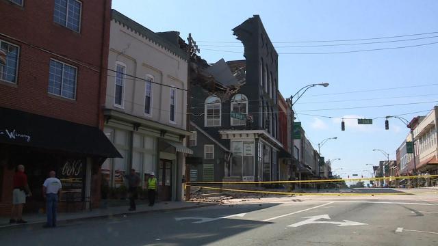 On Main Street in Mount Airy, a building begins to crumble