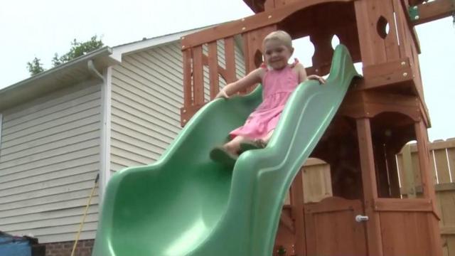 Clayton 5-year-old girl fighting leukemia received a surprise gift of a new playground built by volunteers
