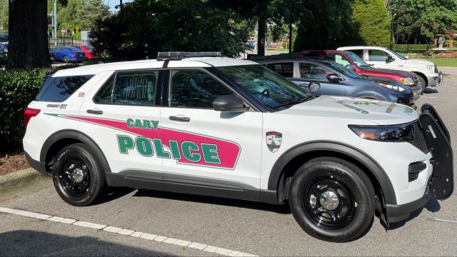 Cary Police Department unveils colorful SUVs for school resource officers 