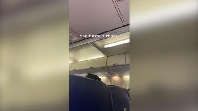 Pilot threatens to turn flight around over nude photo