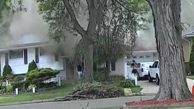 Teens being praised after saving two from house fire