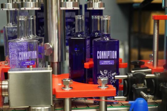At Durham Distillery, the color of Kinship, the latest Conniption gin, showcases how science and art can come together to make something special.