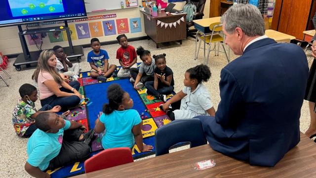 While delivering school supplies to Edgecombe County, Gov. Cooper calls for more aid to districts in need