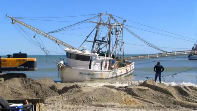 South Carolina shrimp boat freed after Hurricane Ian washed it ashore on Myrtle Beach