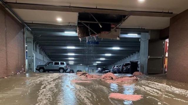 Big mess: Amazon driver hits roof of parking deck at Raleigh apartments
