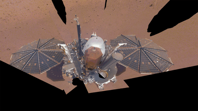 NASA’s InSight Mars lander took this final selfie on April 24, 2022, the 1,211th Martian day, or sol, of the mission. The lander is covered with far more dust than it was in its first selfie, taken in December 2018, not long after landing – or in its second selfie, composed of images taken in March and April 2019. Credit:NASA/JPL-Caltech


