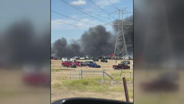 More than 70 cars burn in grass fire started by cigarette