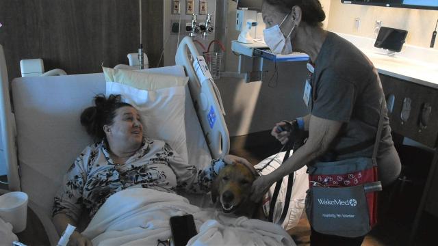 Rusty visits a WakeMed patient in Cary.