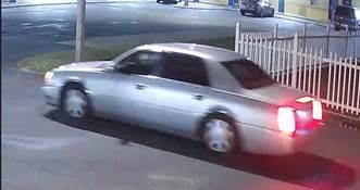 Police on Sunday released surveillance photos of a silver sedan and two people they believe may have information about the shooting. 