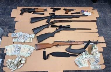 Guns, money seized from Joshua Sheeley