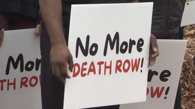 Families of homicide victims join protest against the death penalty in downtown Raleigh