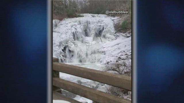 Waterfall frozen over in Tennessee as temperatures dip