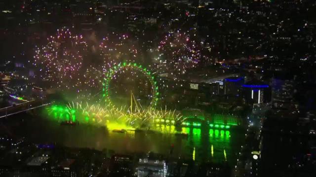 Fireworks ring in NYE on the banks of the Thames in London