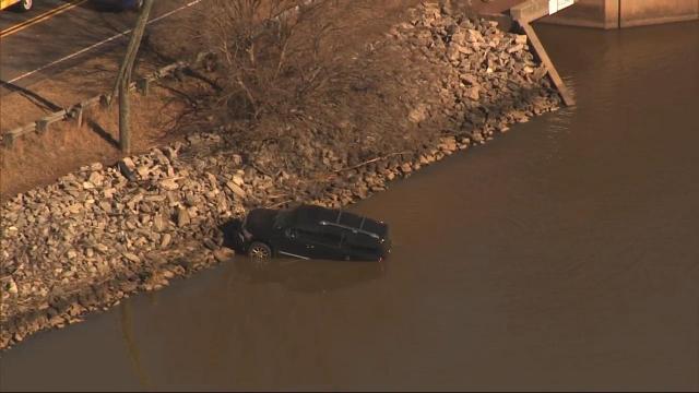 Driver survives after crashing into Lake Crabtree off Aviation Parkway