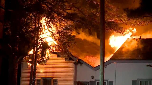 Ceiling collapses on Garner firefighter, home destroyed in massive blaze