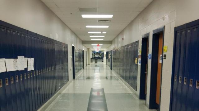 LED lights illuminate the school hallway