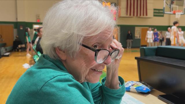 Cardinal Gibbons honors scorekeeper Peggy Taylor after 40 years of service 