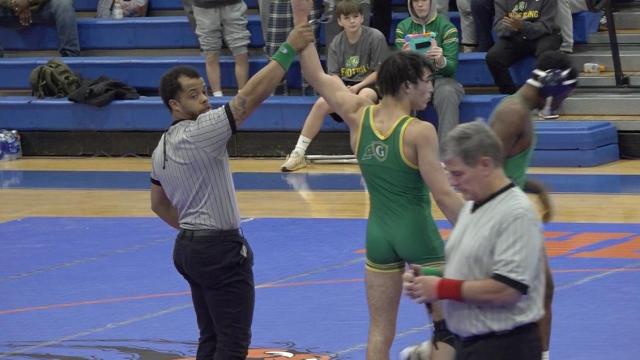 Cardinal Gibbons advances over Cary, Athens Drive, Green Level in 4A dual team wrestling