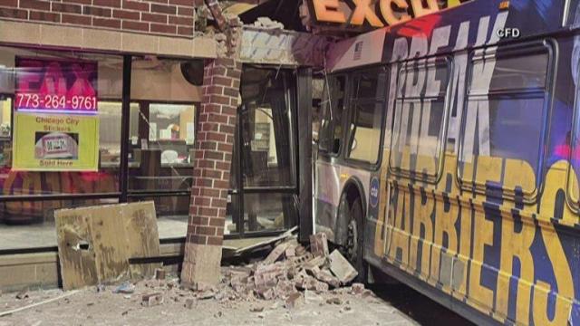 Four injured when bus crashes into building