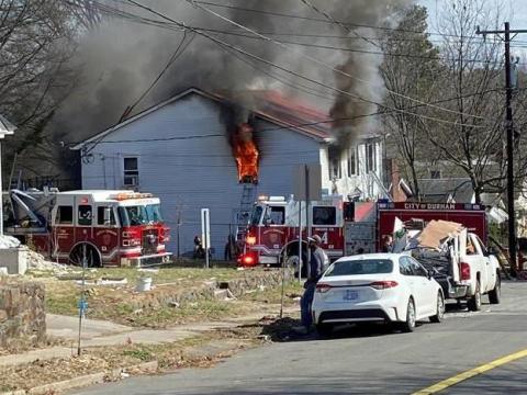 Durham house fire displaces 10 residents