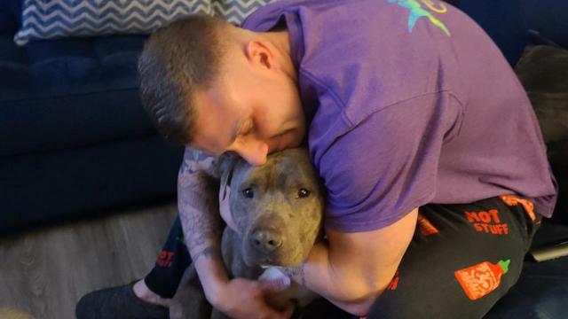 Fort Bragg specialist adopts, embraces dog with missing ear from SPCA of Wake County