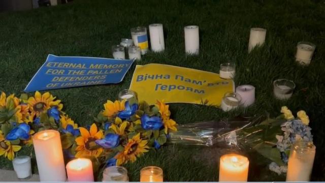 'I'm trying to hold on because I don't know what to do': Hundreds gather for Ukraine vigil Friday