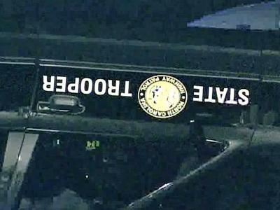 Highway Patrol Cruiser Rolls in U.S. 401 Crash