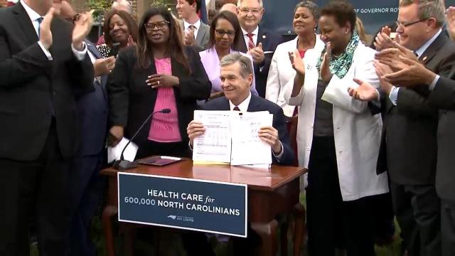 Gov. Cooper officially signs Medicaid expansion into law
