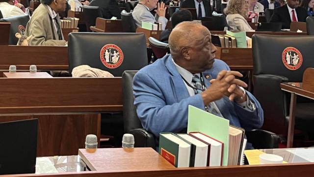 A handful of key Democrats missed a gun bill vote in the NC House of Representatives Wednesday, leaving empty seats. Also pictured in the blue jacket: State Rep. Marvin Lucas, who attended the session despite having a broken leg, according to House Democratic Leader Robert Reives.