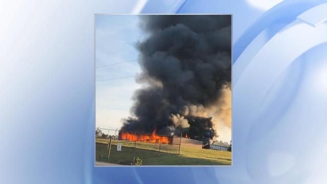 Fire at abandoned school under control; investigation begins Tuesday