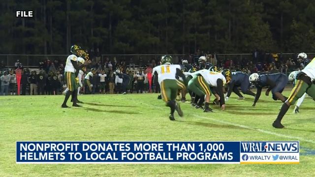 Holt Brothers Foundation donates more than 1,000 helmets to local football programs