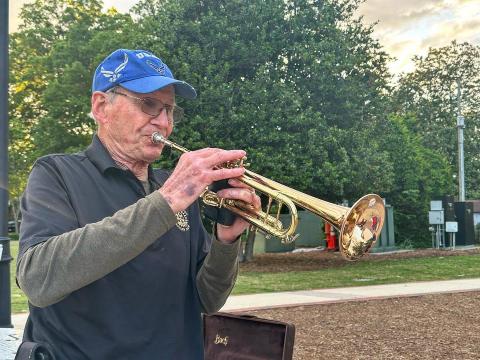 Cary's 'Trumpet Man:' Veteran raises $14,000 for Alzheimer's research playing music in downtown