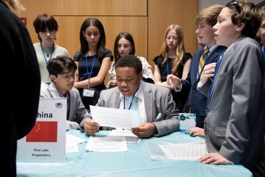 Students debate, solve major challenges at Bilingual Model UN